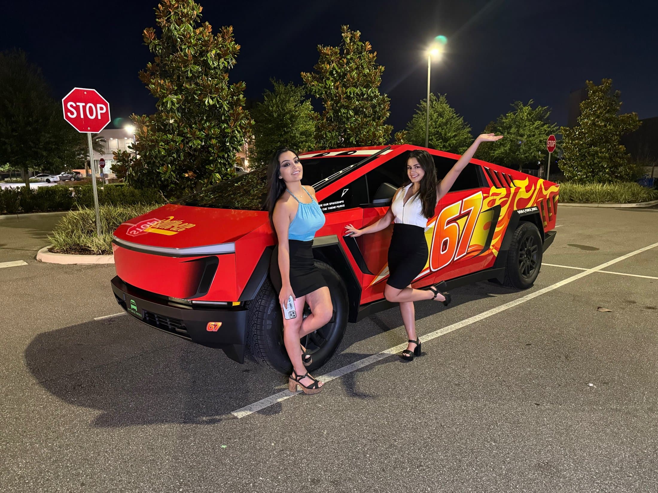 G-Force Ridez flagship Lightning Machine — the red number-67 Cybertruck with two riders